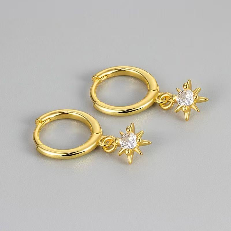 Saffron sun huggie earrings