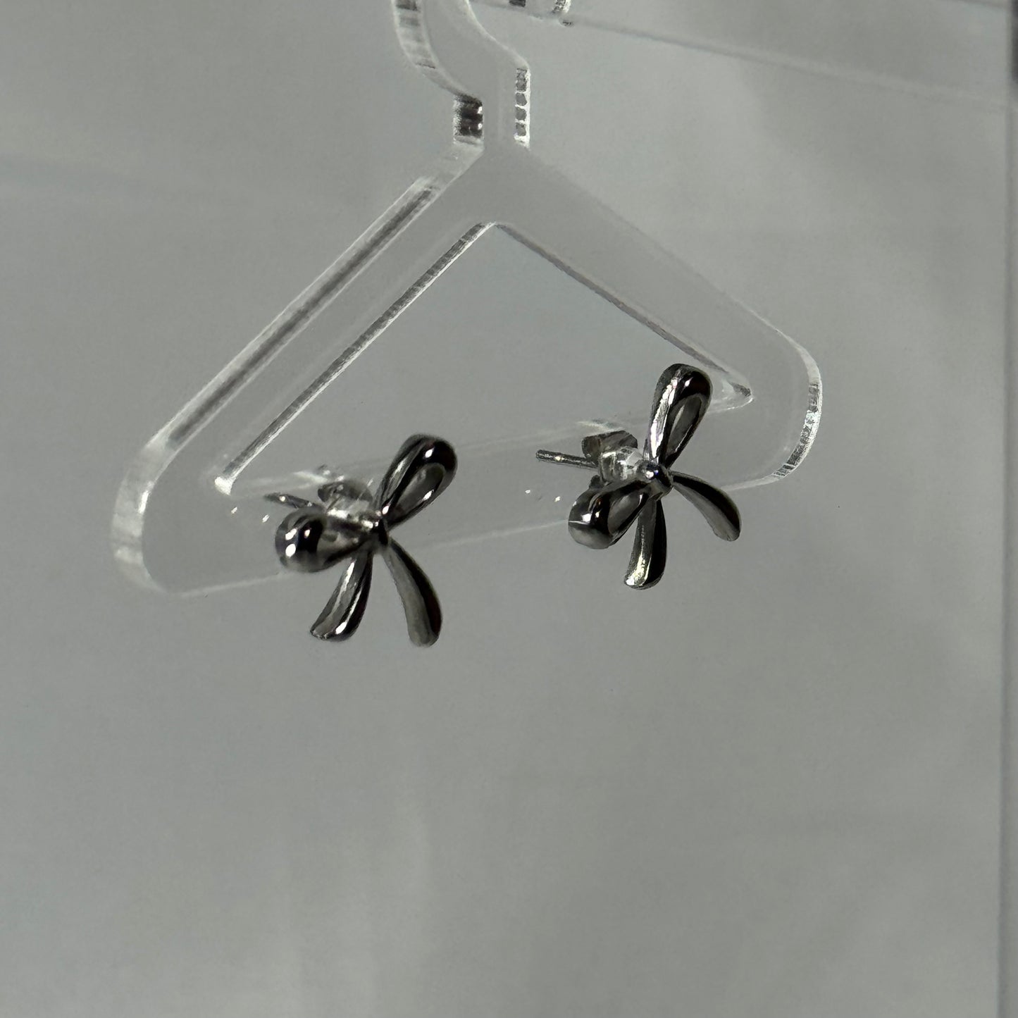 Lacey bow stud earrings