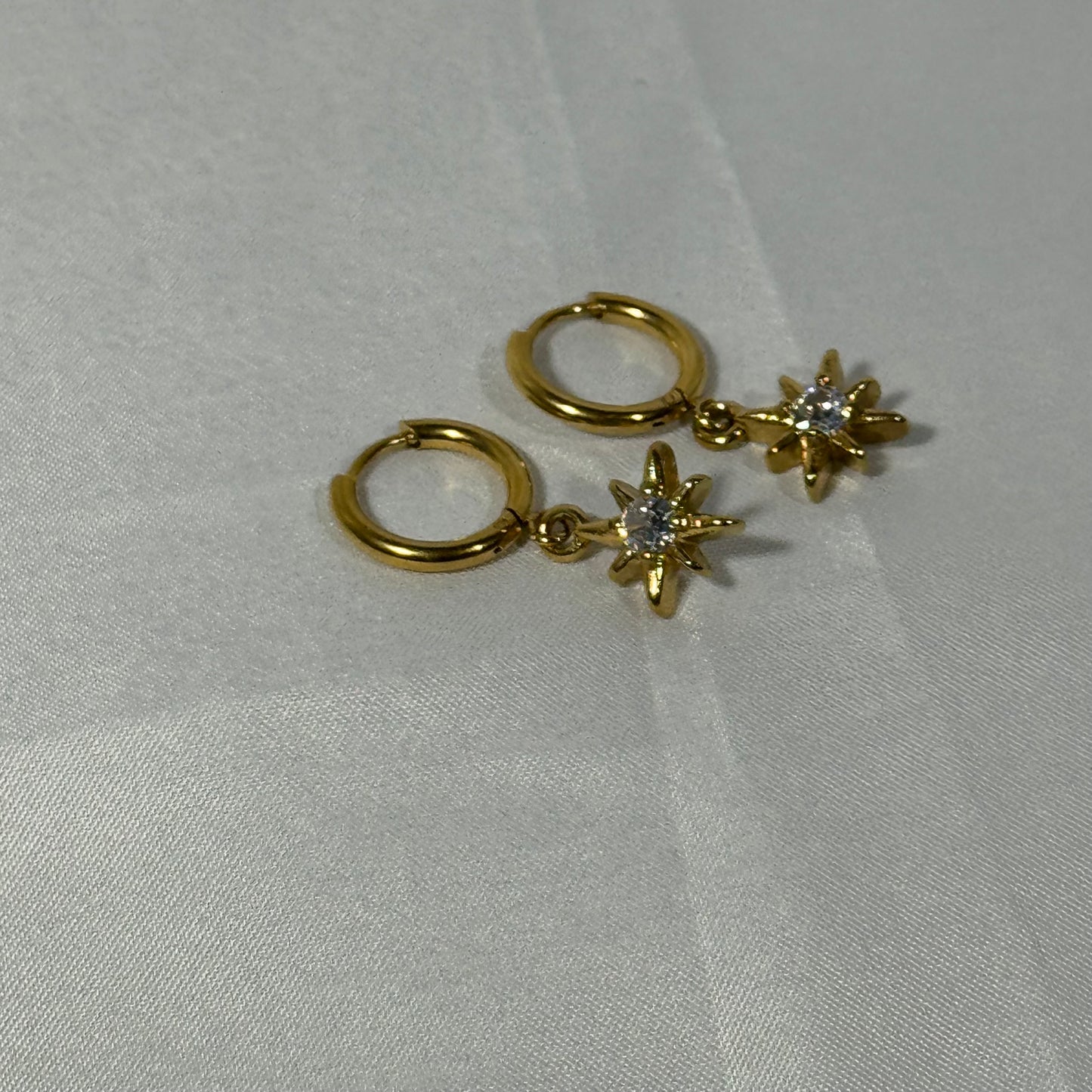 Saffron sun huggie earrings