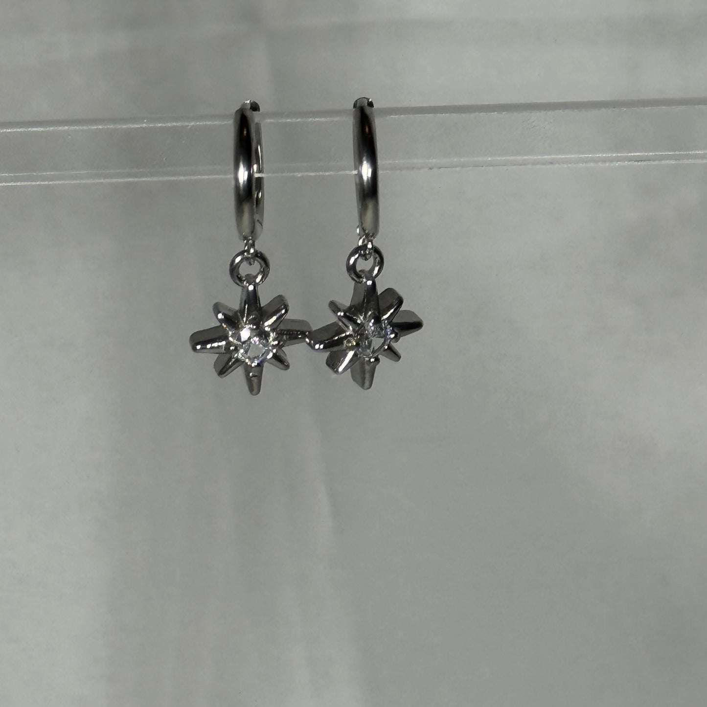Saffron sun huggie earrings