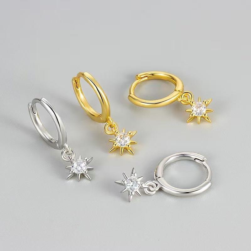 Saffron sun huggie earrings