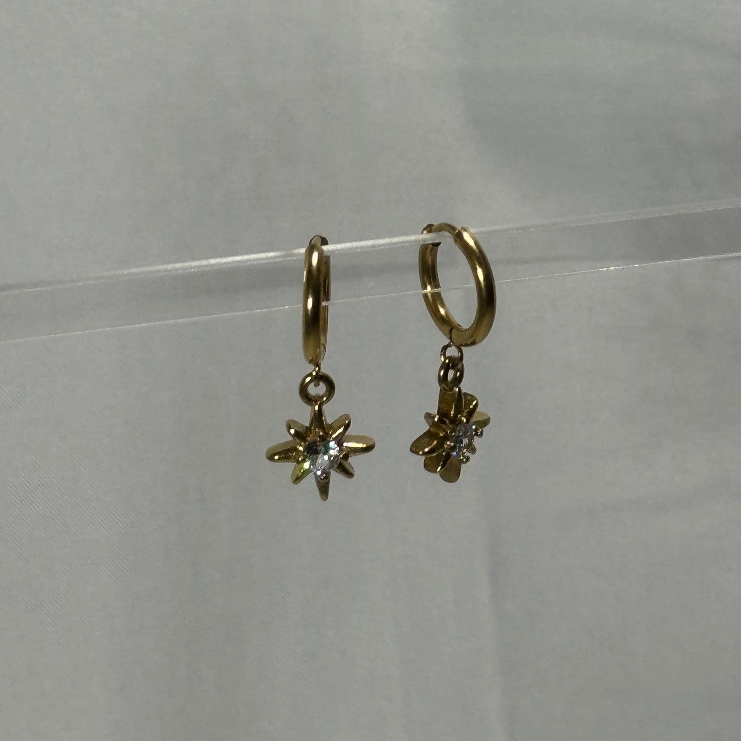Saffron sun huggie earrings