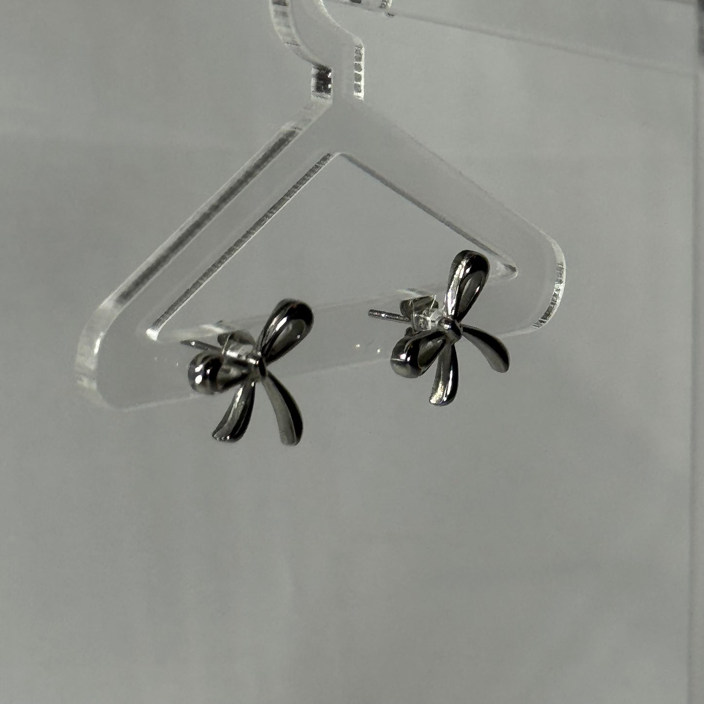 Lacey bow stud earrings