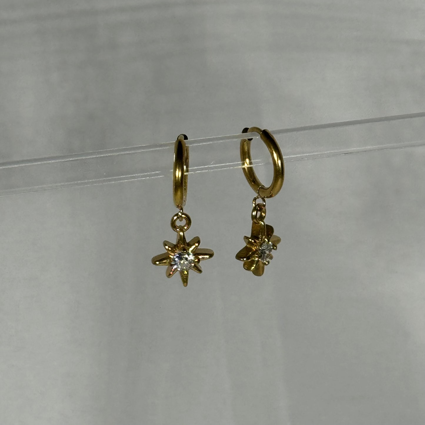 Saffron sun huggie earrings