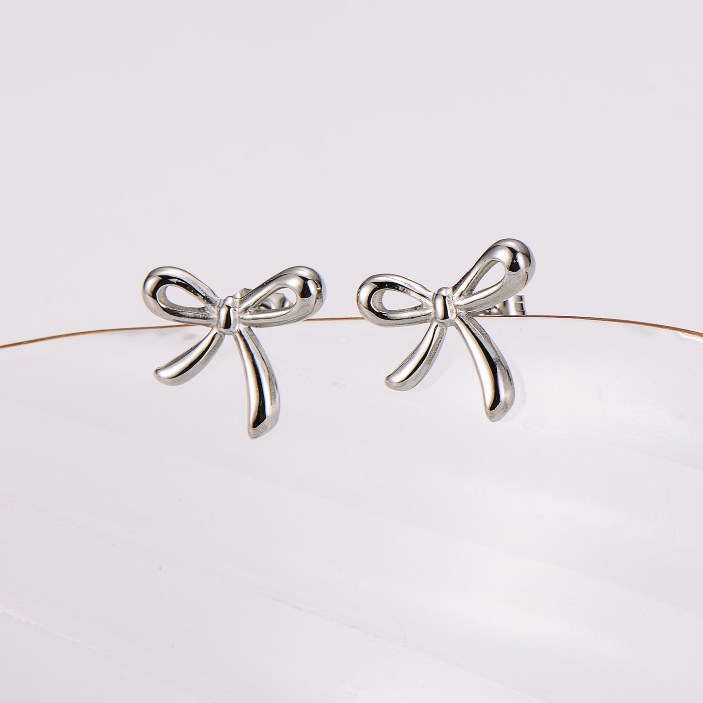 Lacey bow stud earrings