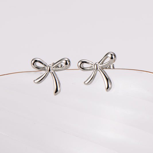 Lacey bow stud earrings