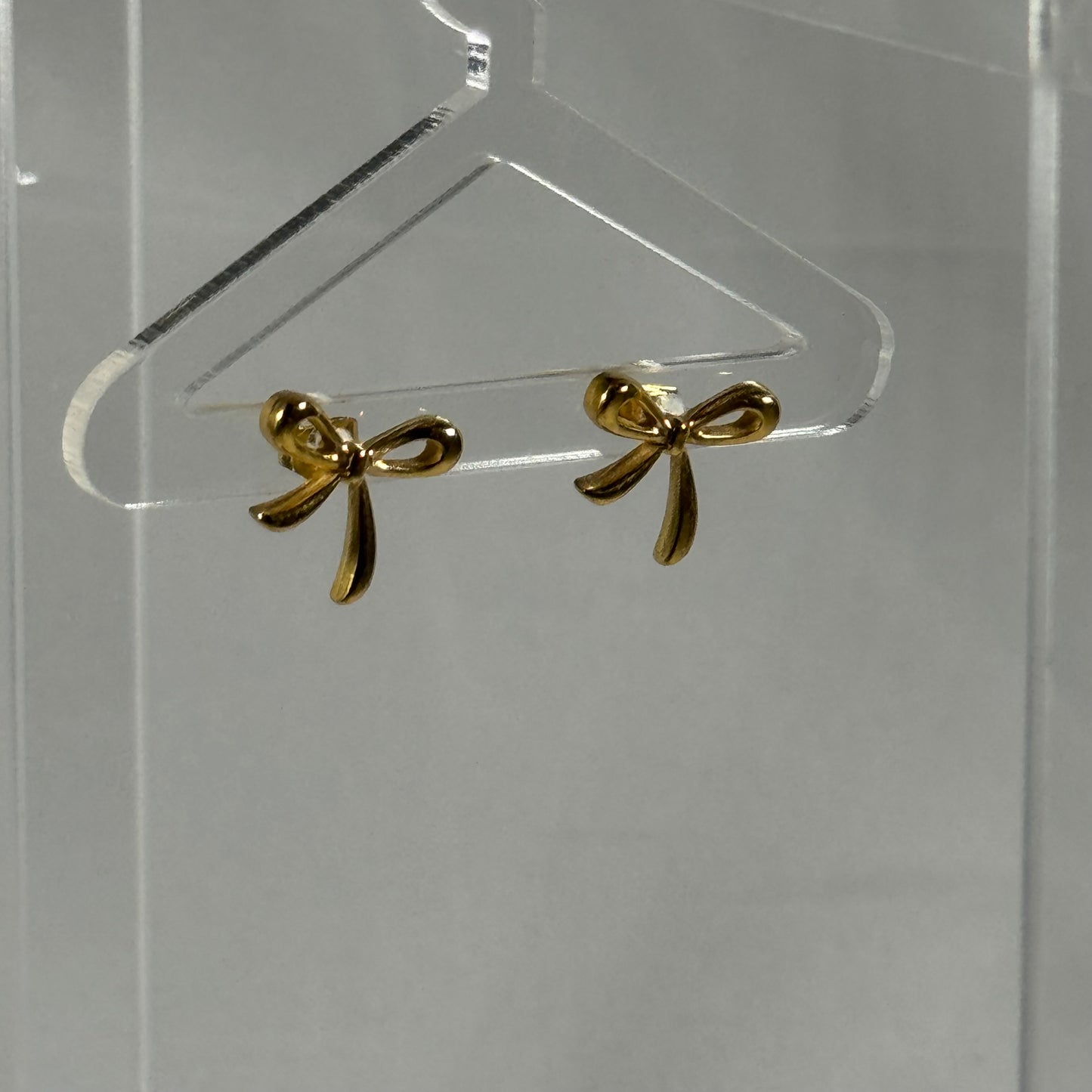 Lacey bow stud earrings