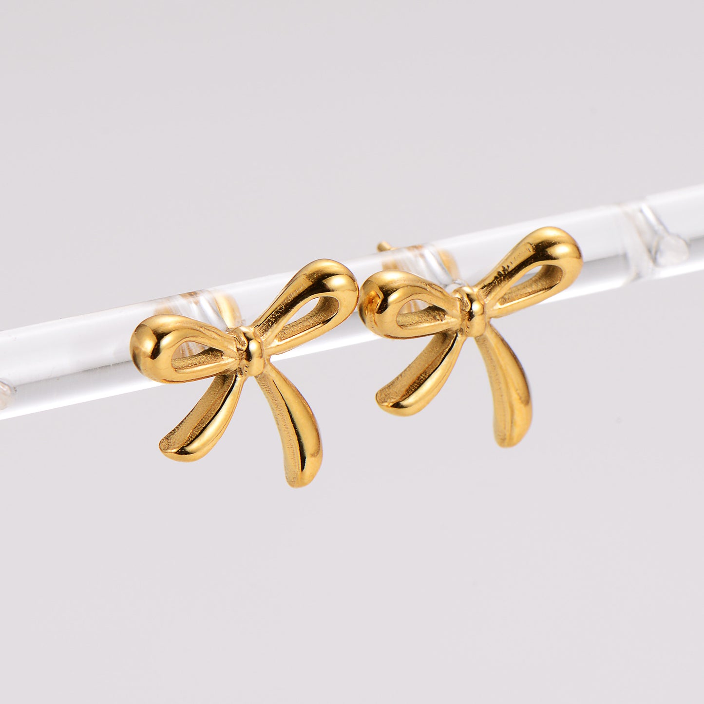 Lacey bow stud earrings
