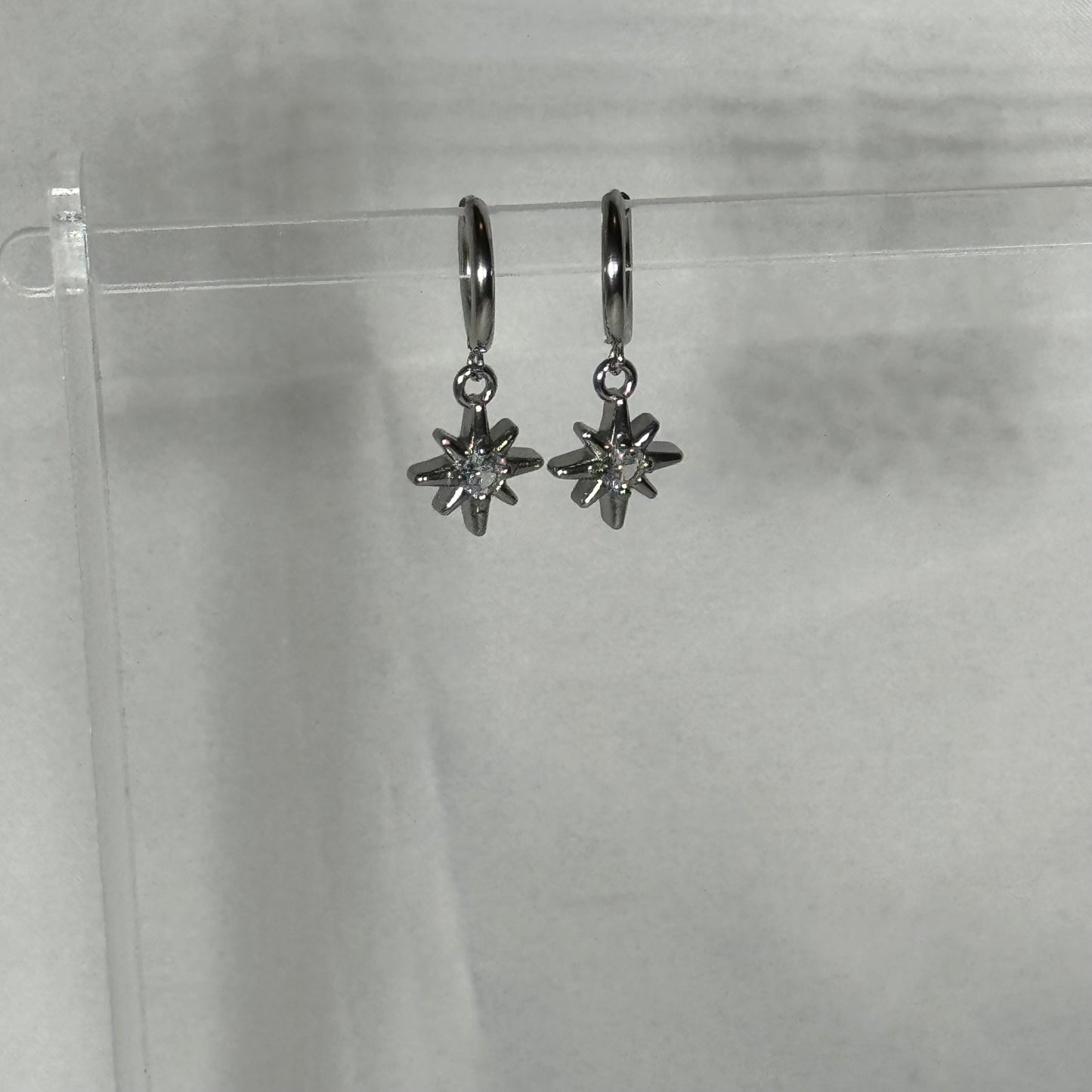 Saffron sun huggie earrings