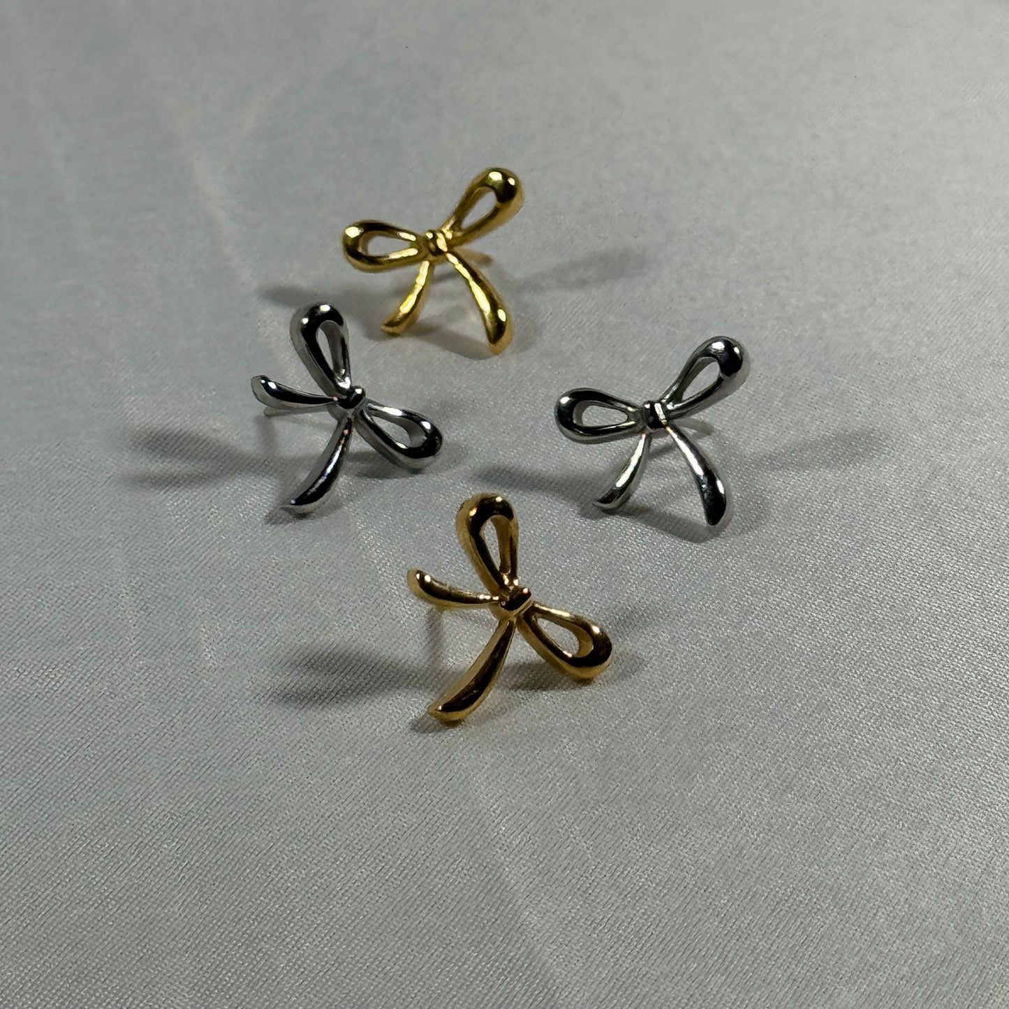 Lacey bow stud earrings