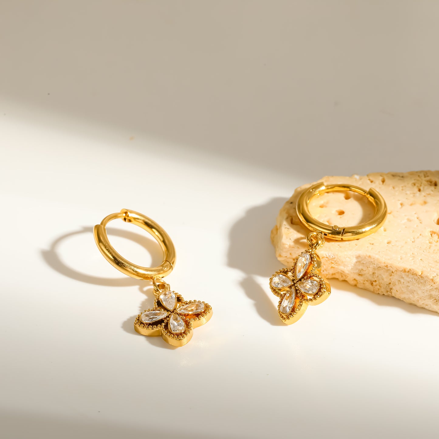 Stella flower zircon huggies